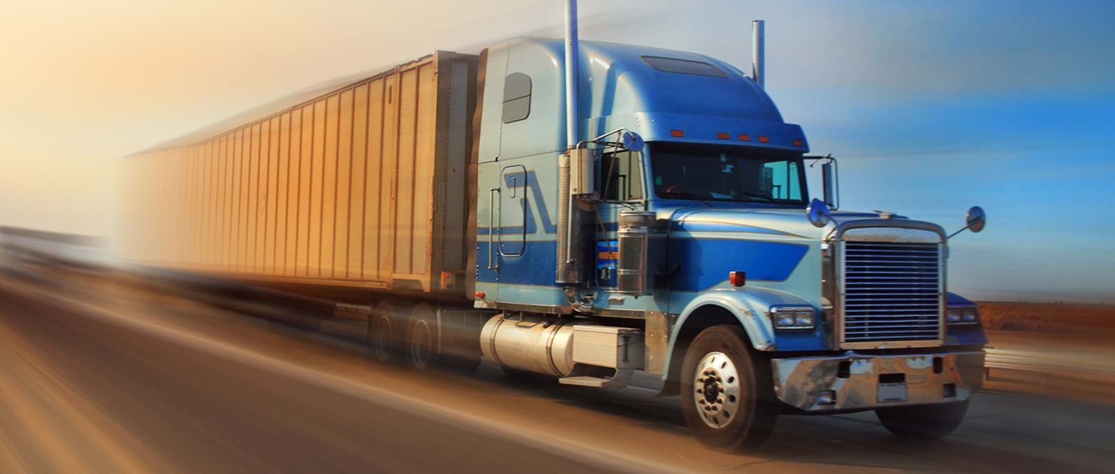 Enclosed transport semi truck on the highway