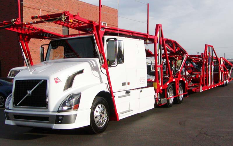 White car carrier truck